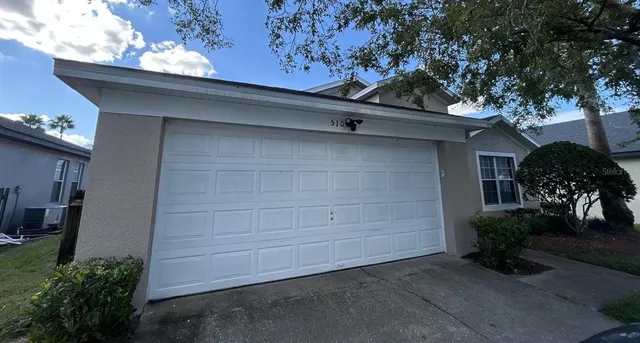 a house view with a outdoor space