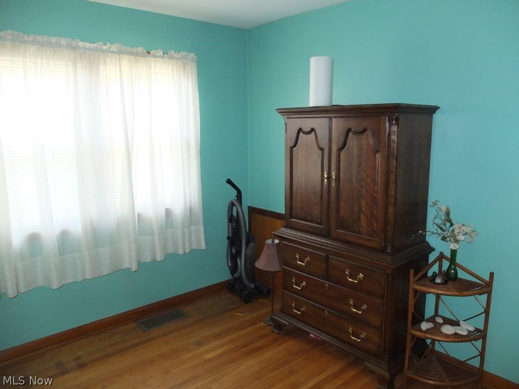 1127 Raff Road Southwest Canton, OH 44710 - Photo 10 of 15 Bedroom 3 with hardwood floor.
