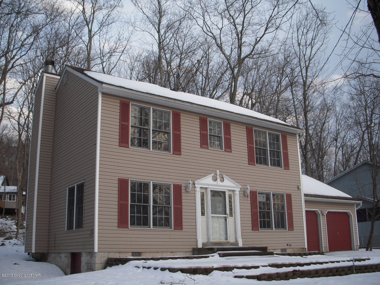 1227 Salisbury Road Bushkill, PA 18324 - Photo 15 of 15 a front view of a house with a yard