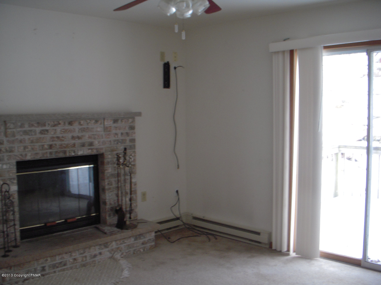 1227 Salisbury Road Bushkill, PA 18324 - Photo 5 of 15 a living room with a fireplace