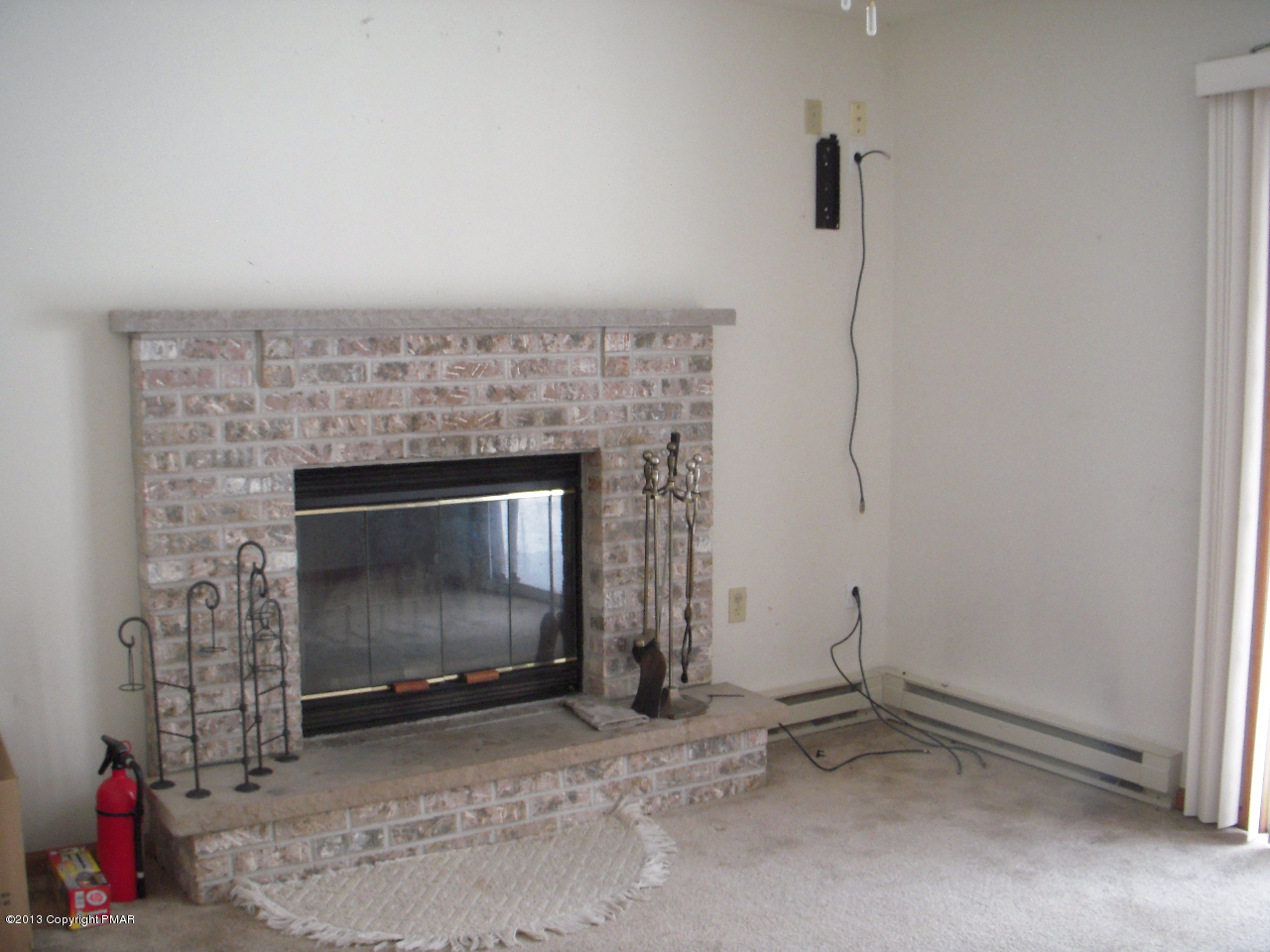 1227 Salisbury Road Bushkill, PA 18324 - Photo 6 of 15 a living room with a fireplace