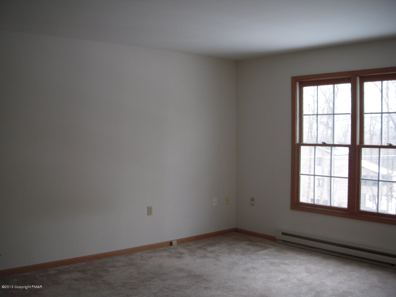1227 Salisbury Road Bushkill, PA 18324 - Photo 9 of 15 an empty room with a window