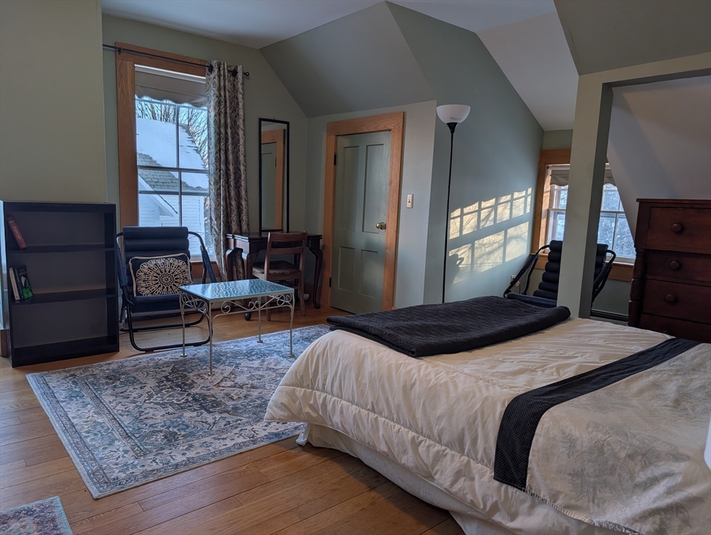 527 Main Street, Unit 2 Ashfield, MA 01330 - Photo 4 of 27 a bedroom with bed and window