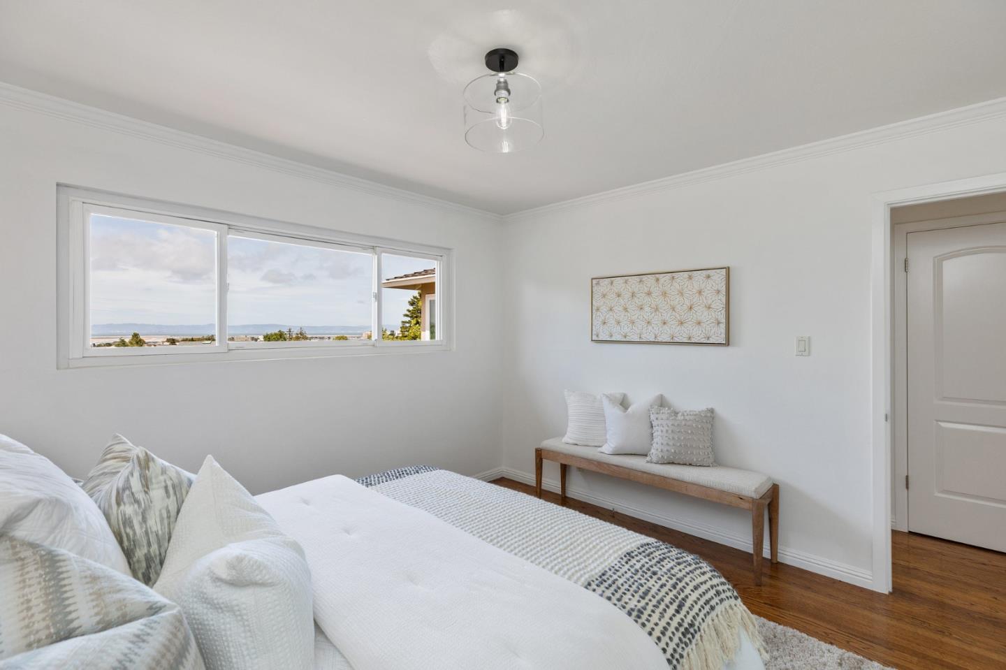 1808 Castenada Drive Burlingame, CA 94010 - Photo 23 of 37 a bedroom with a bed and a window