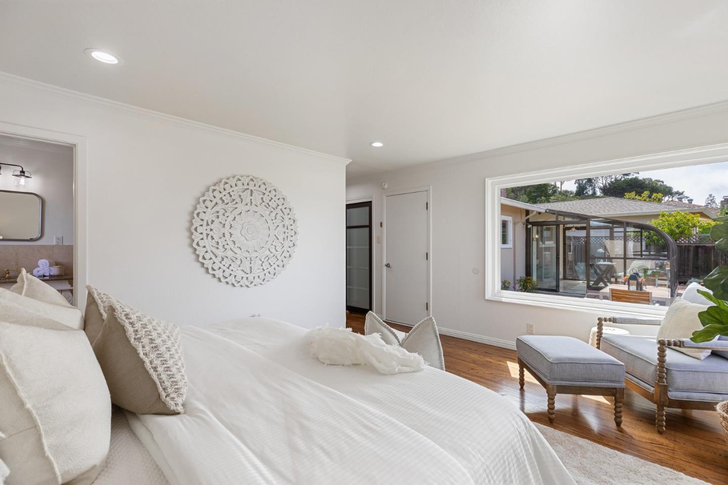 1808 Castenada Drive Burlingame, CA 94010 - Photo 29 of 37 a bedroom with a bed window and chair