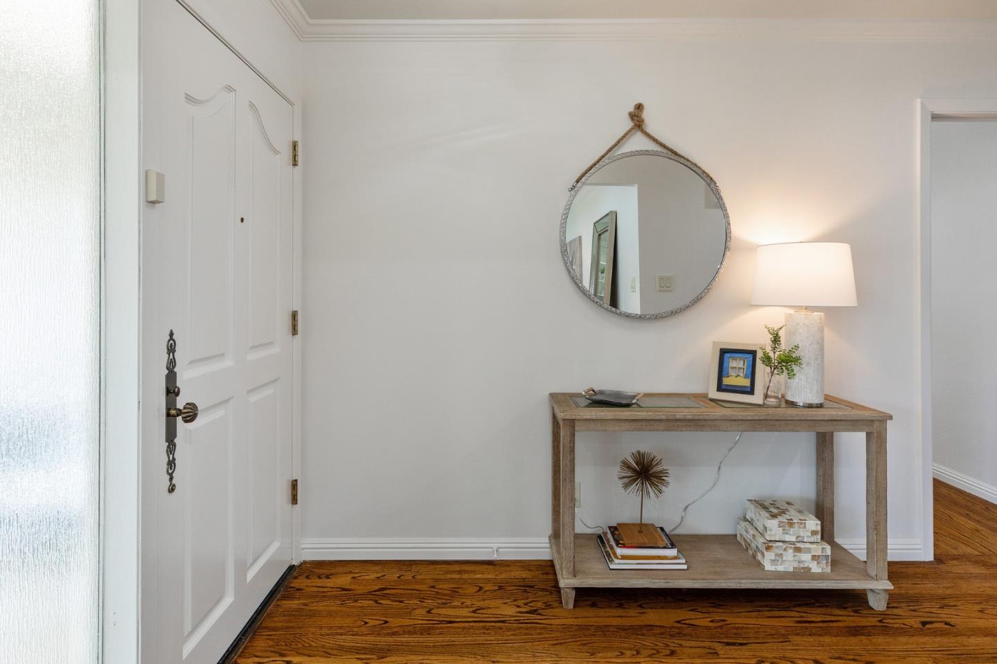 1808 Castenada Drive Burlingame, CA 94010 - Photo 4 of 37 a bathroom with a sink and mirror