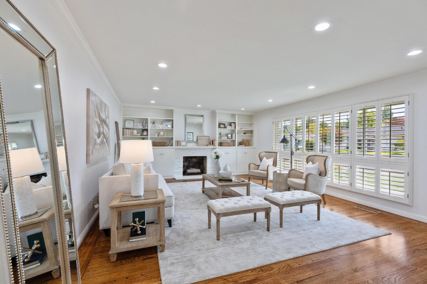 1808 Castenada Drive Burlingame, CA 94010 - Photo 6 of 37 a living room with fireplace furniture and a wooden floor