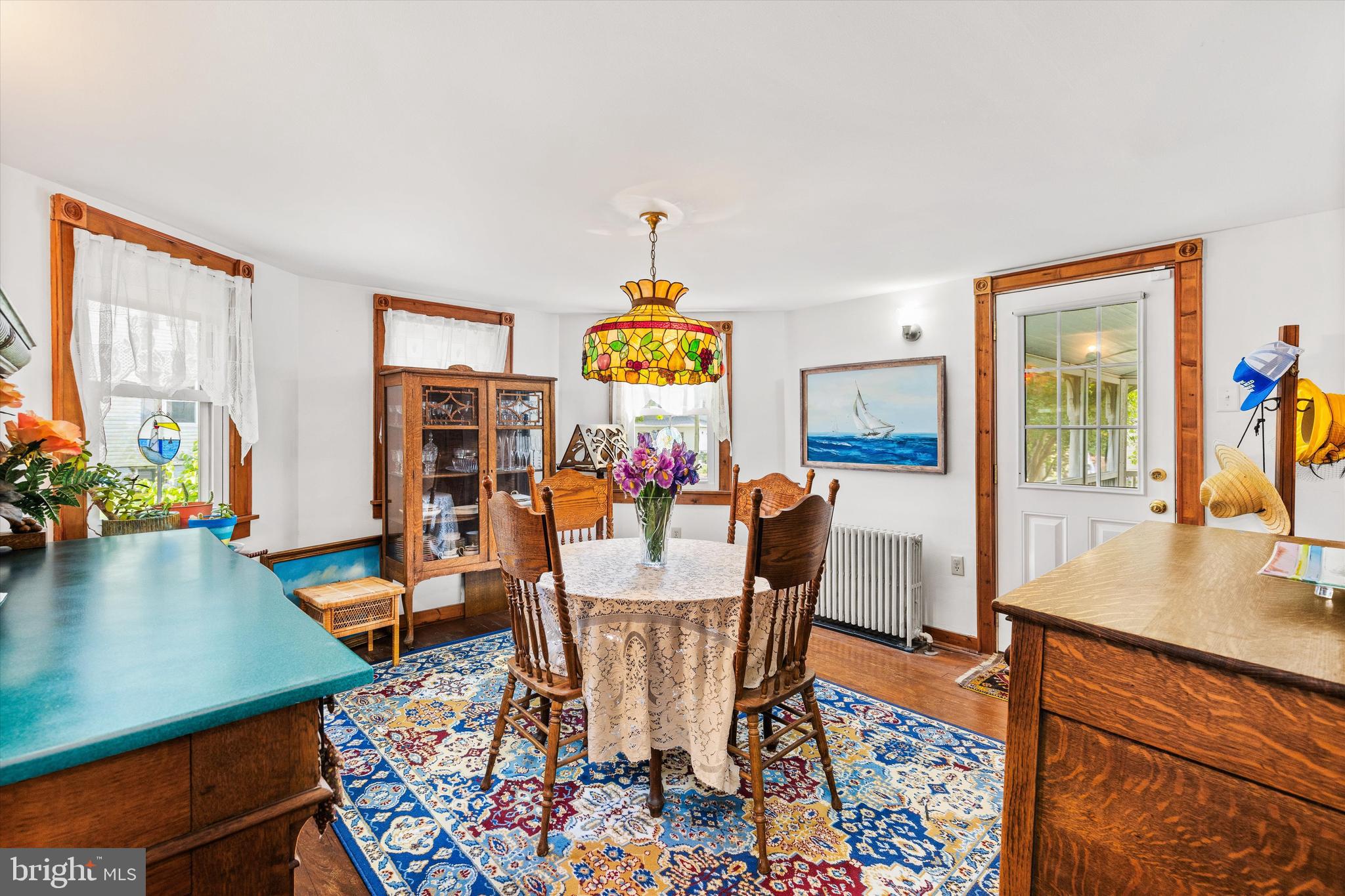 4665 Tyaskin Road Tyaskin, MD 21865 - Photo 18 of 40 a view of a dining room with furniture window and wooden floor