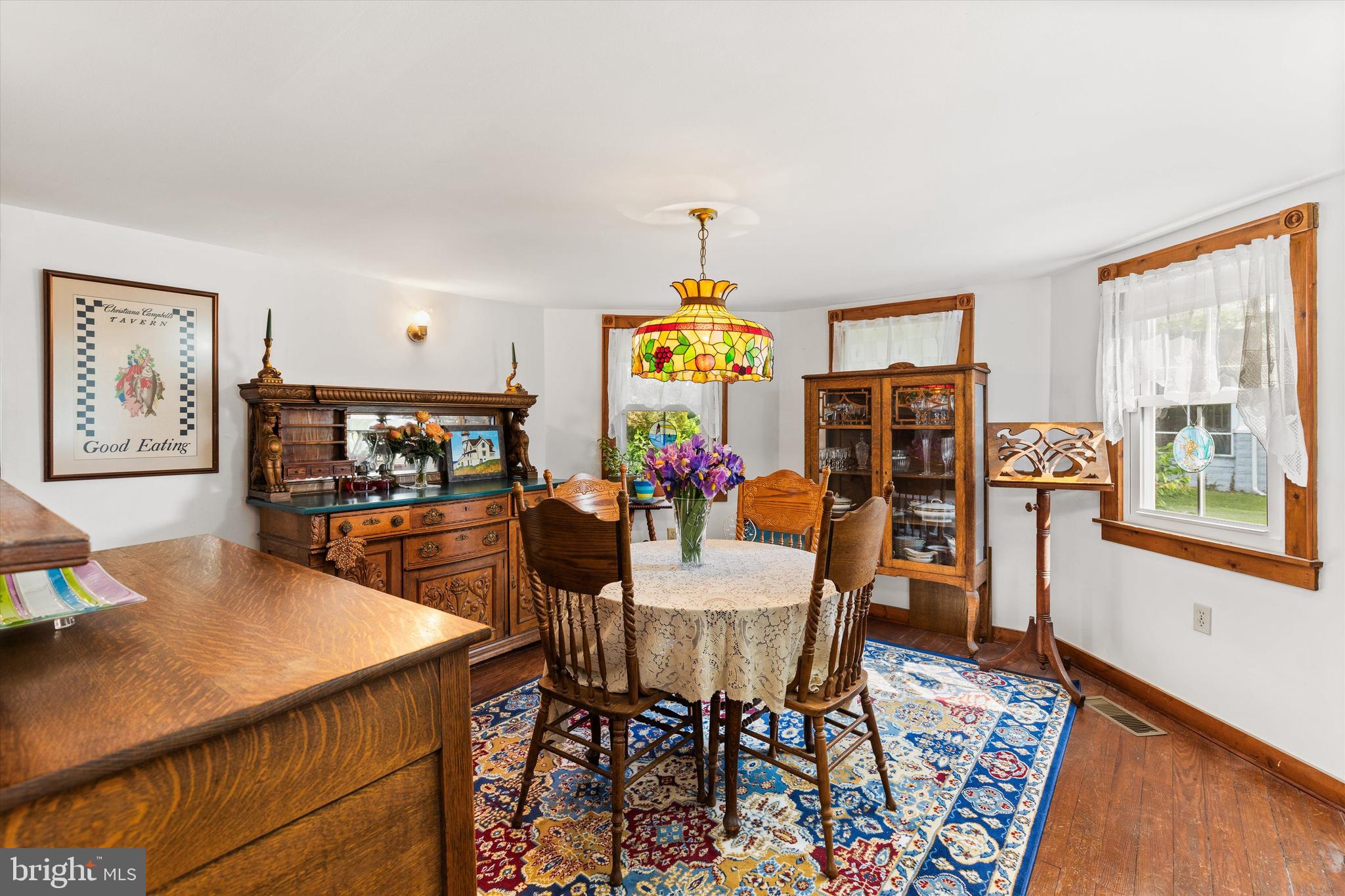 4665 Tyaskin Road Tyaskin, MD 21865 - Photo 19 of 40 a view of a dining room with furniture window and wooden floor