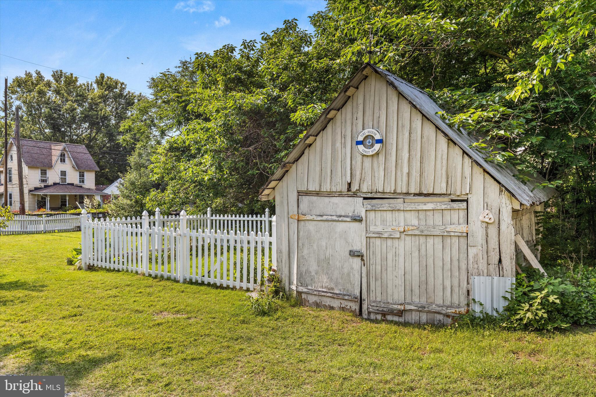 4665 Tyaskin Road Tyaskin, MD 21865 - Photo 40 of 40 a view of a small house with wooden fence next to a yard