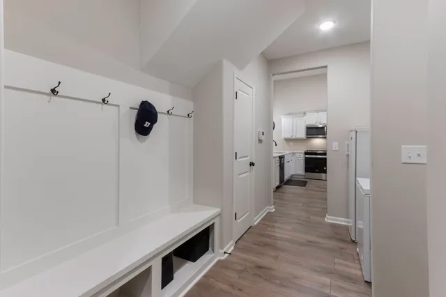 a hallway with cabinets