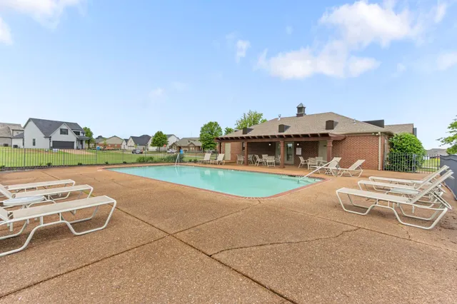 a view of a chairs and tables in the patio