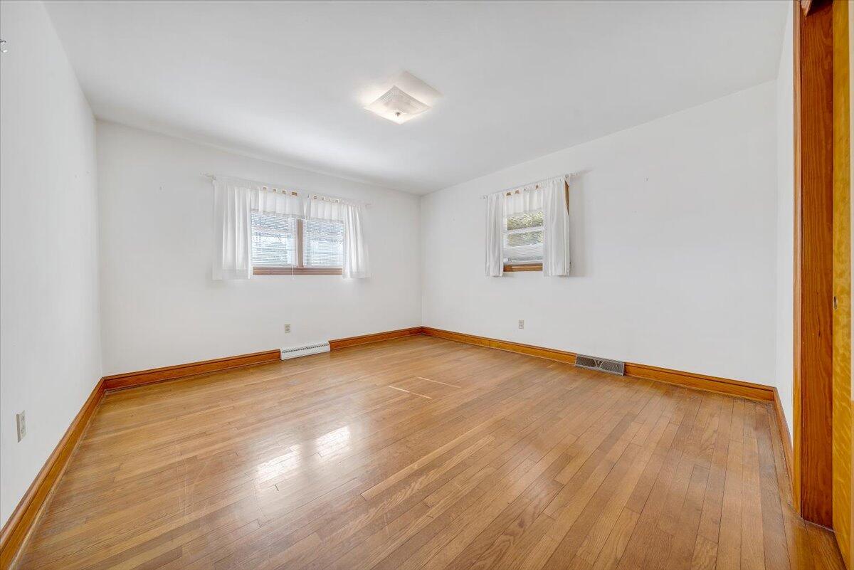 3400 Dillons Fork Road Fieldale, VA 24089 - Photo 27 of 45 a view of empty room with wooden floor