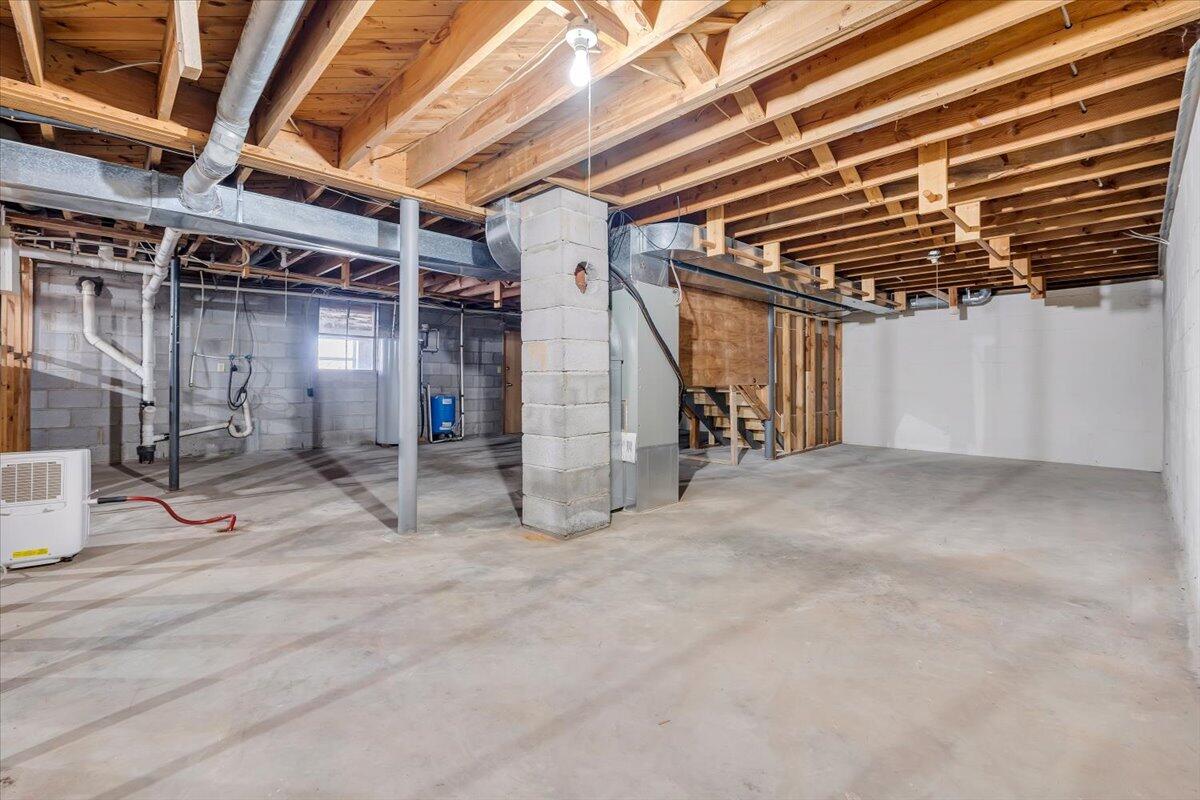 3400 Dillons Fork Road Fieldale, VA 24089 - Photo 32 of 45 a view of empty room with wooden walls