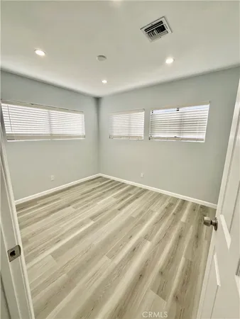 a view of a room with window and stairs