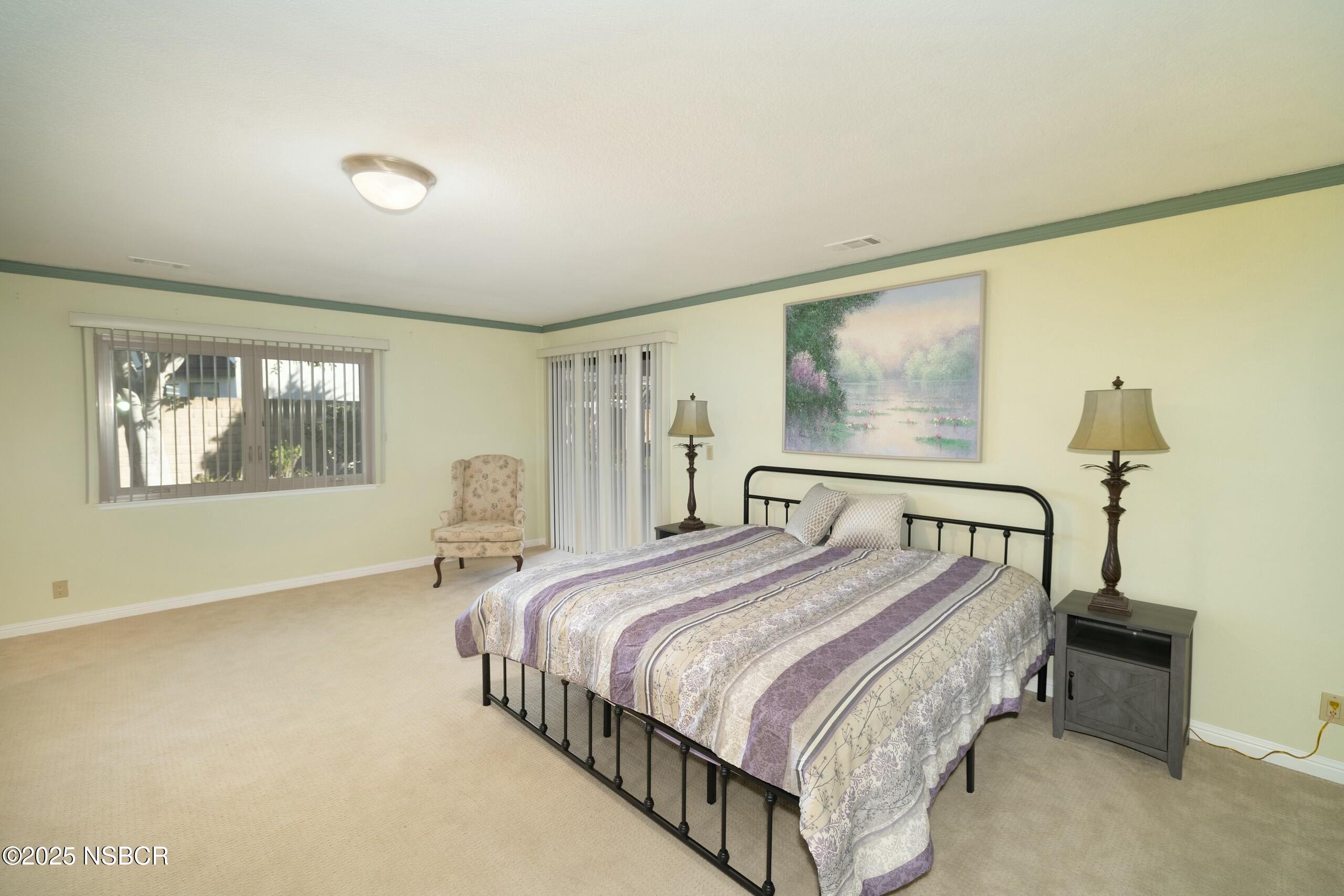 1303 Ruby Court Santa Maria, CA 93454 - Photo 14 of 22 a bedroom with a bed and window