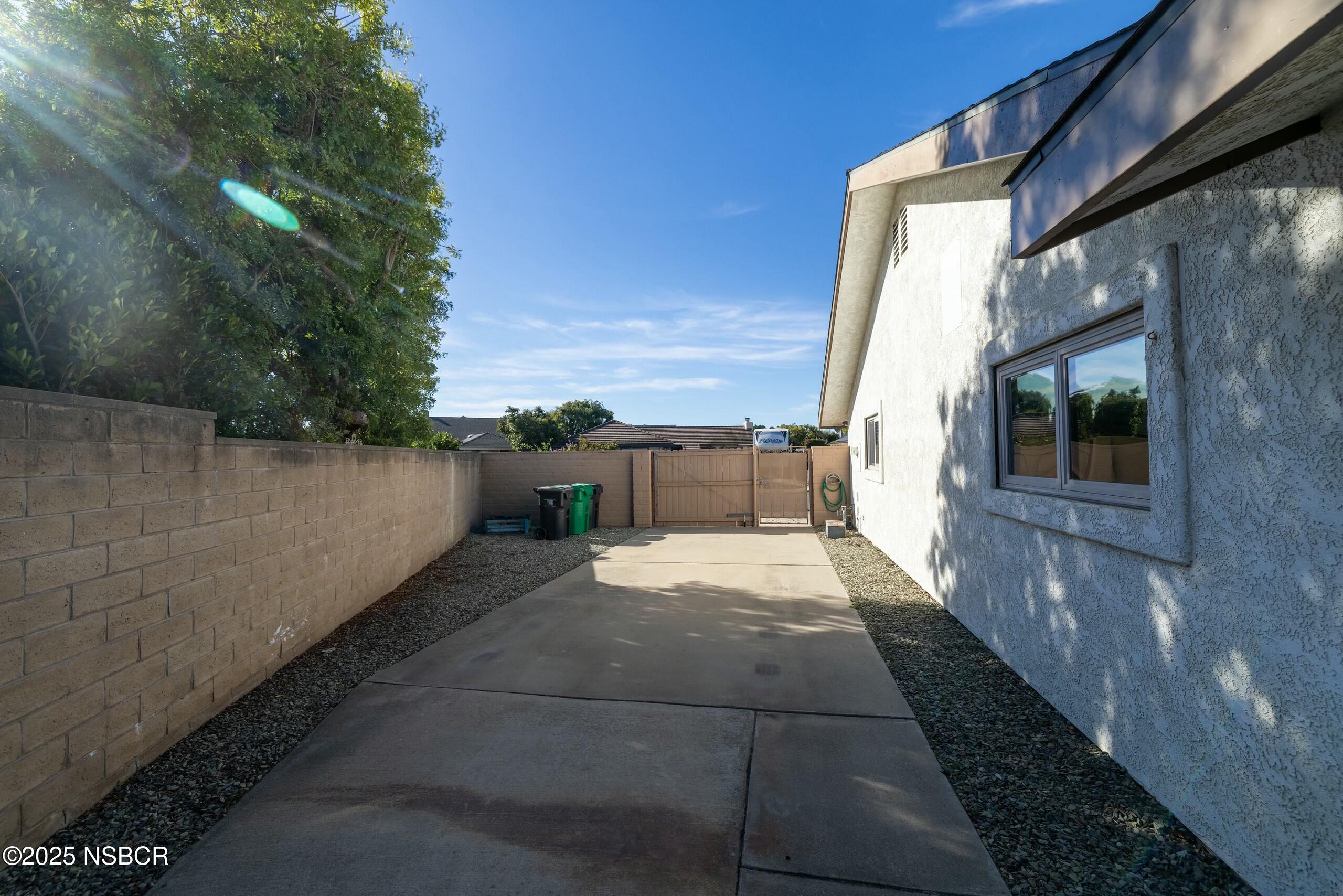 1303 Ruby Court Santa Maria, CA 93454 - Photo 22 of 22 a path view of a house with a yard