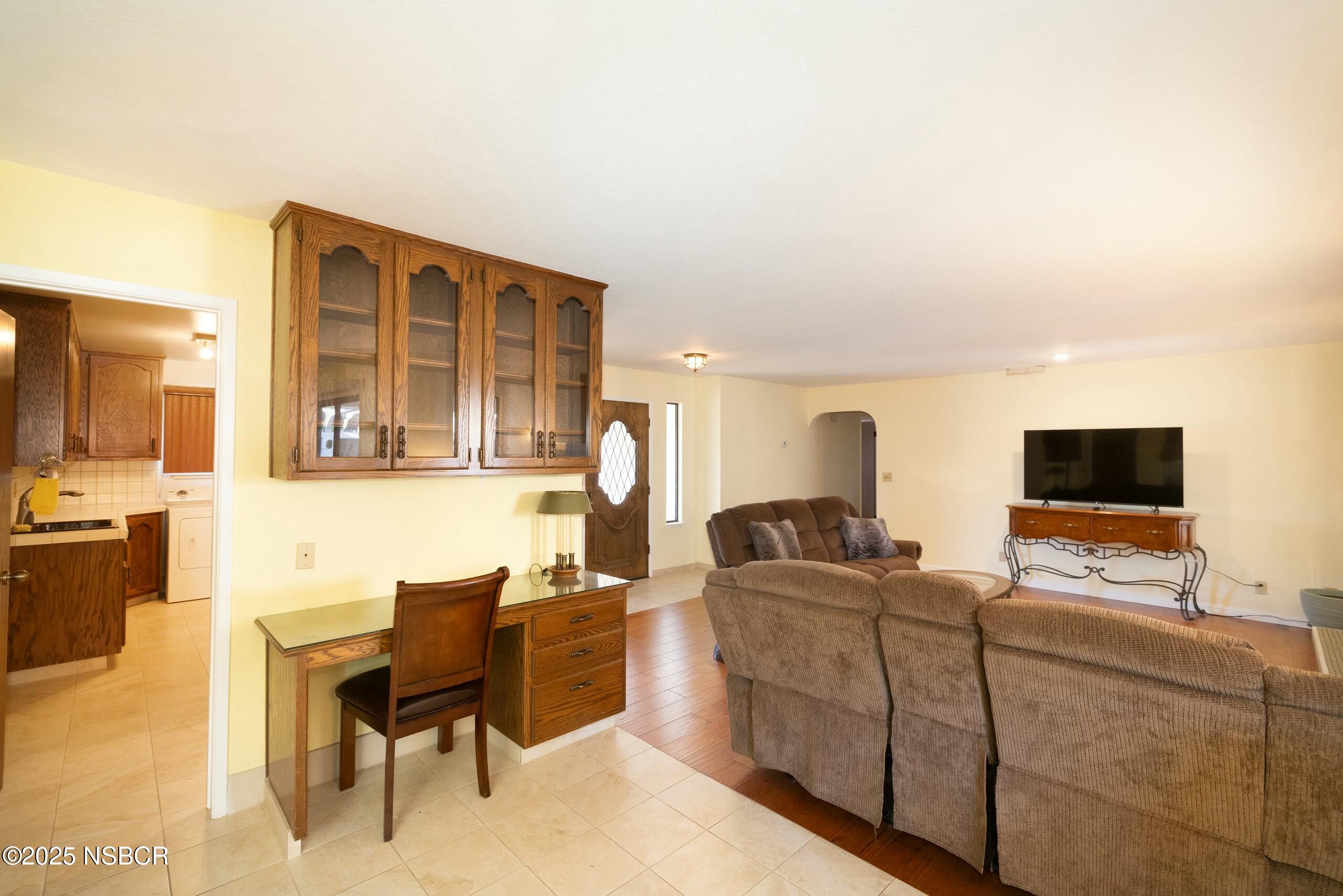 1303 Ruby Court Santa Maria, CA 93454 - Photo 7 of 22 a living room with furniture and a flat screen tv