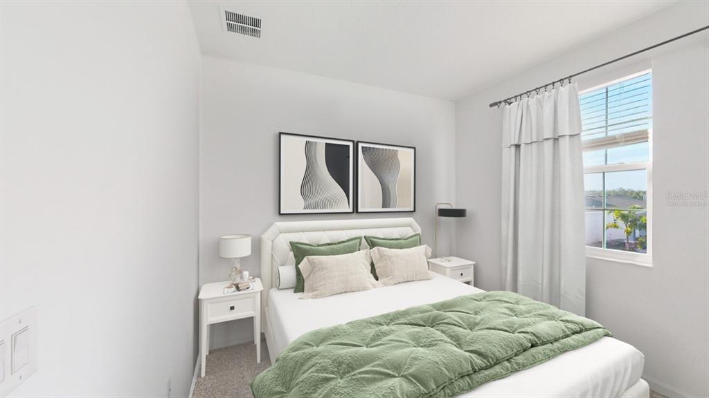 706 Abita Alley DeBary, FL 32713 - Photo 5 of 13 a bedroom with a bed and a window