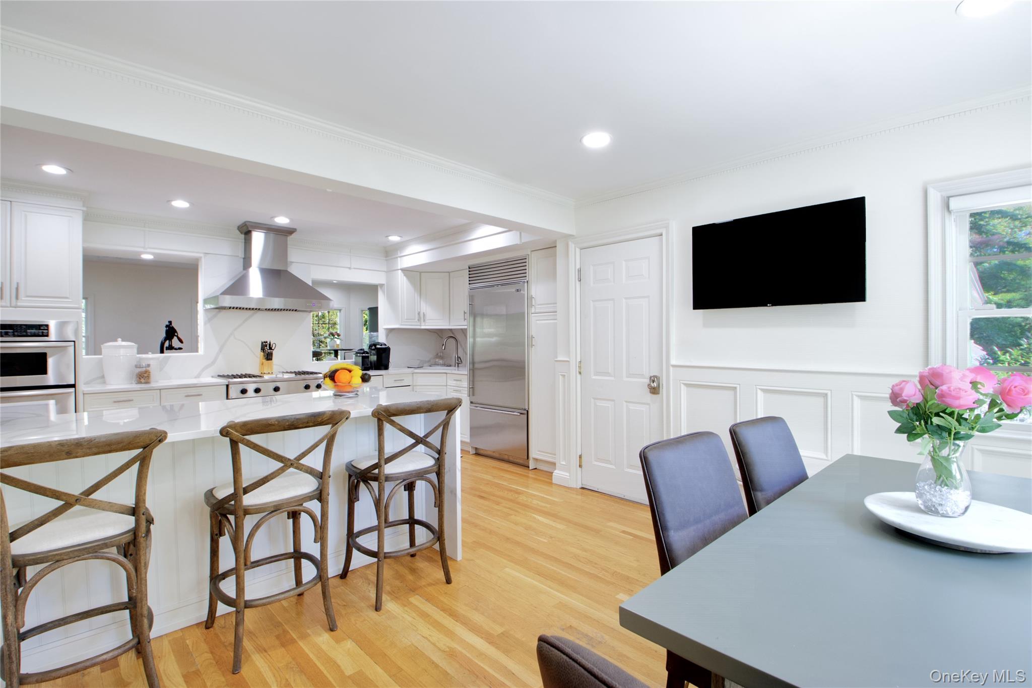 39 Squirrel Hill Road East Hills, NY 11577 - Photo 11 of 35 a view of a dining room with furniture and wooden floor