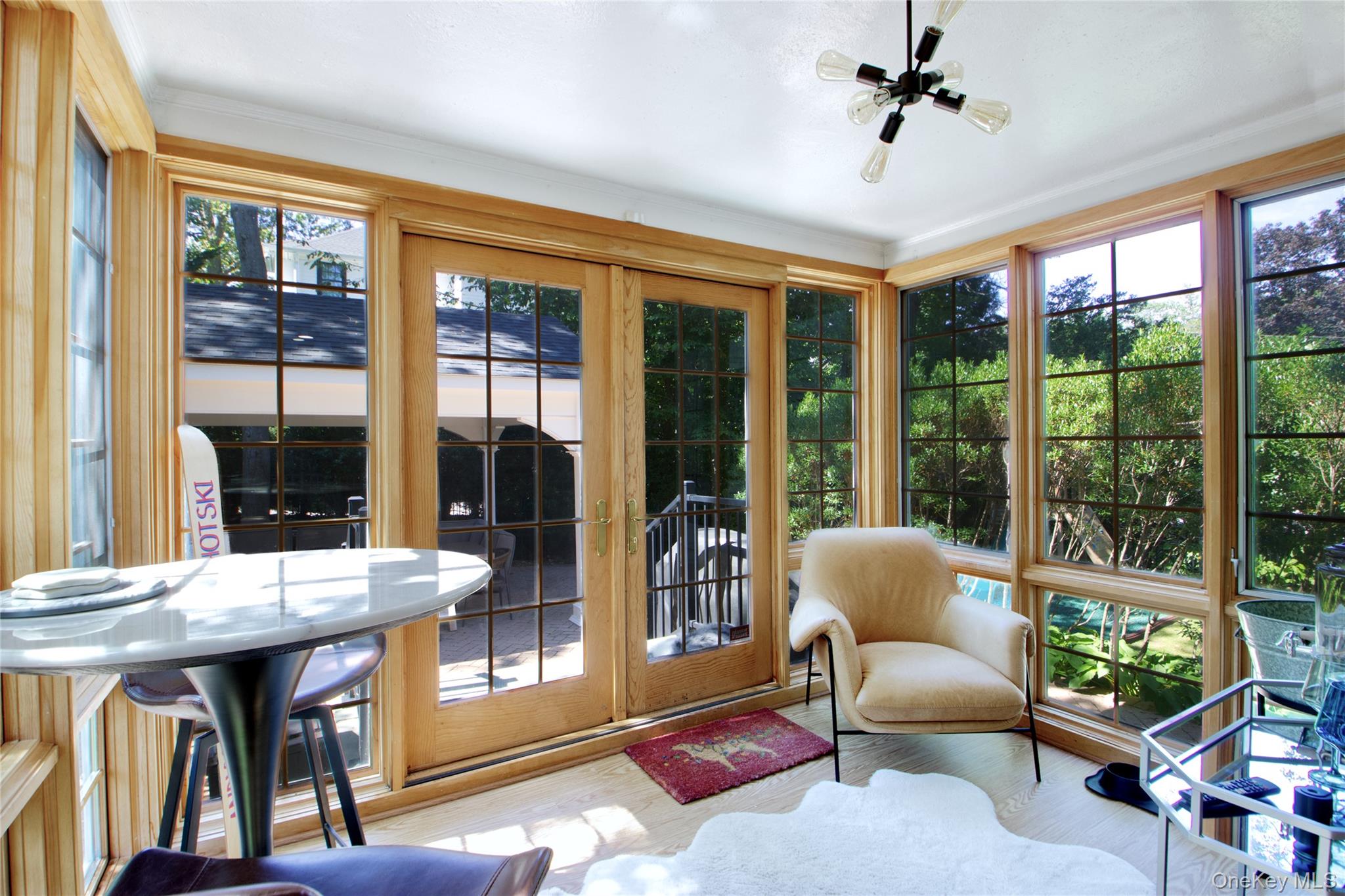 39 Squirrel Hill Road East Hills, NY 11577 - Photo 14 of 35 a view of a dining room with furniture window and outside view