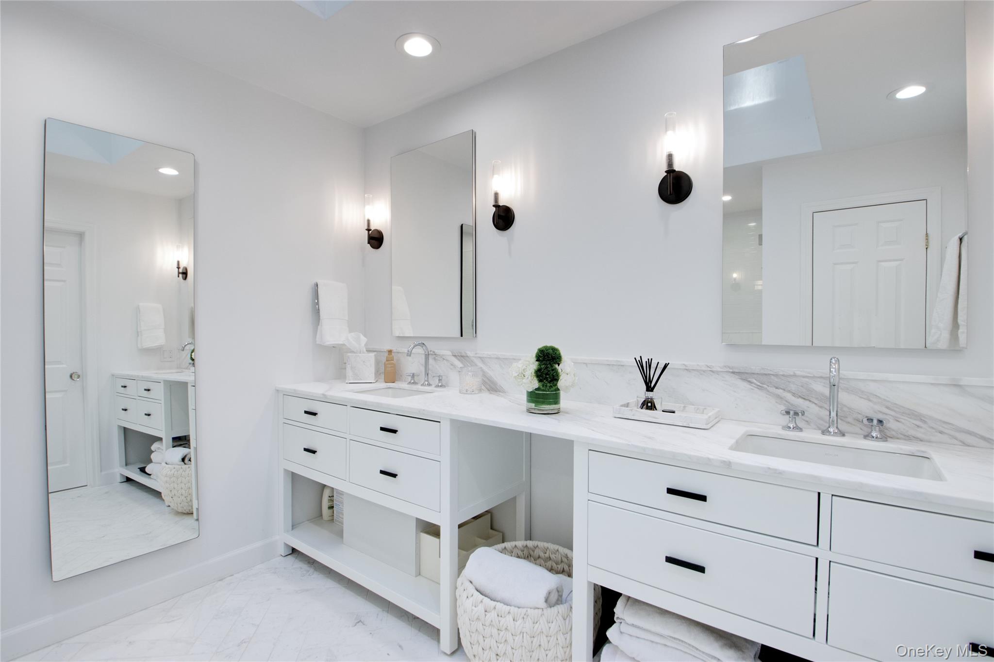 39 Squirrel Hill Road East Hills, NY 11577 - Photo 19 of 35 a bathroom with a double vanity sink mirror and shower