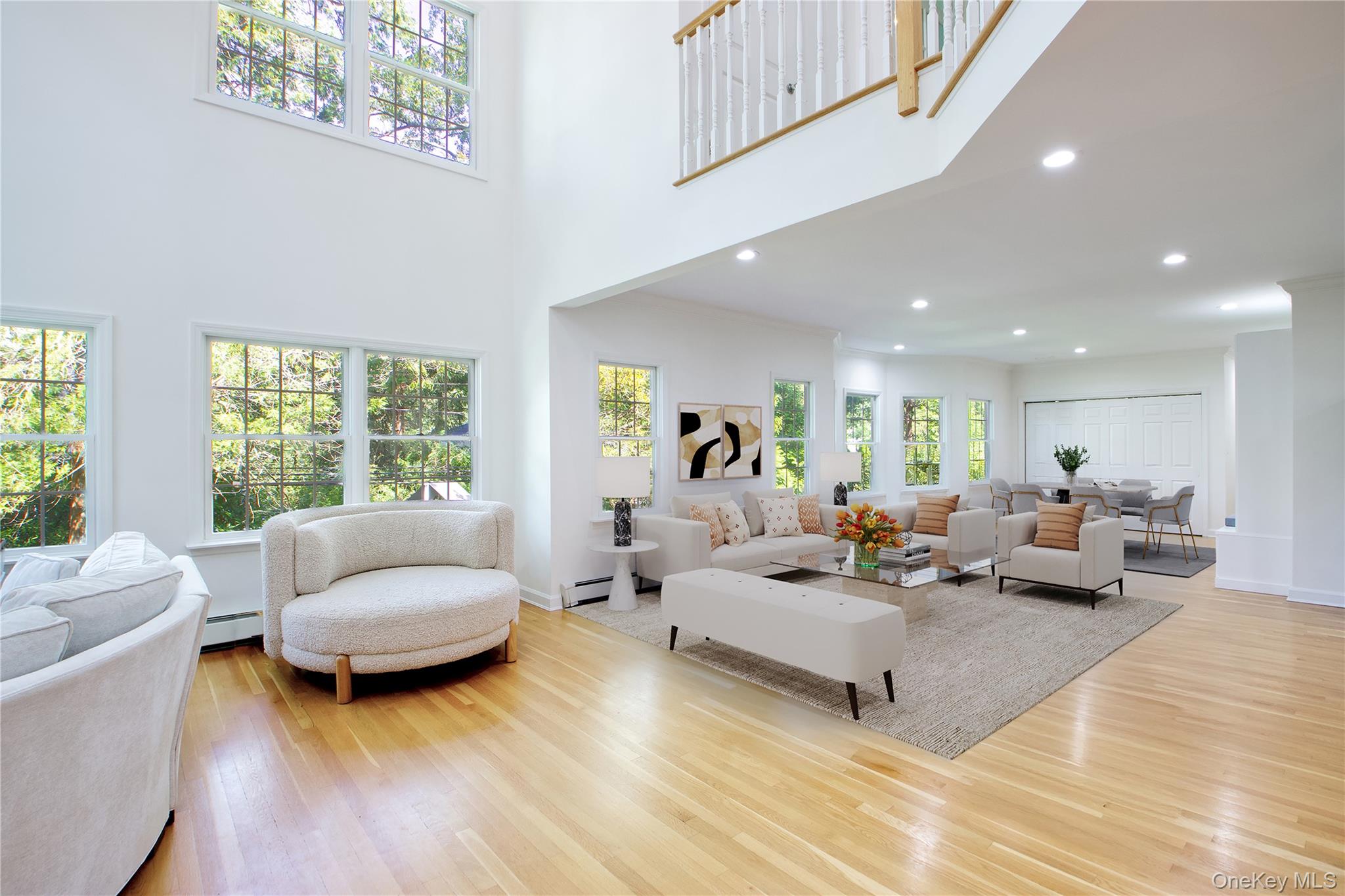 39 Squirrel Hill Road East Hills, NY 11577 - Photo 4 of 35 a living room with furniture and a large window