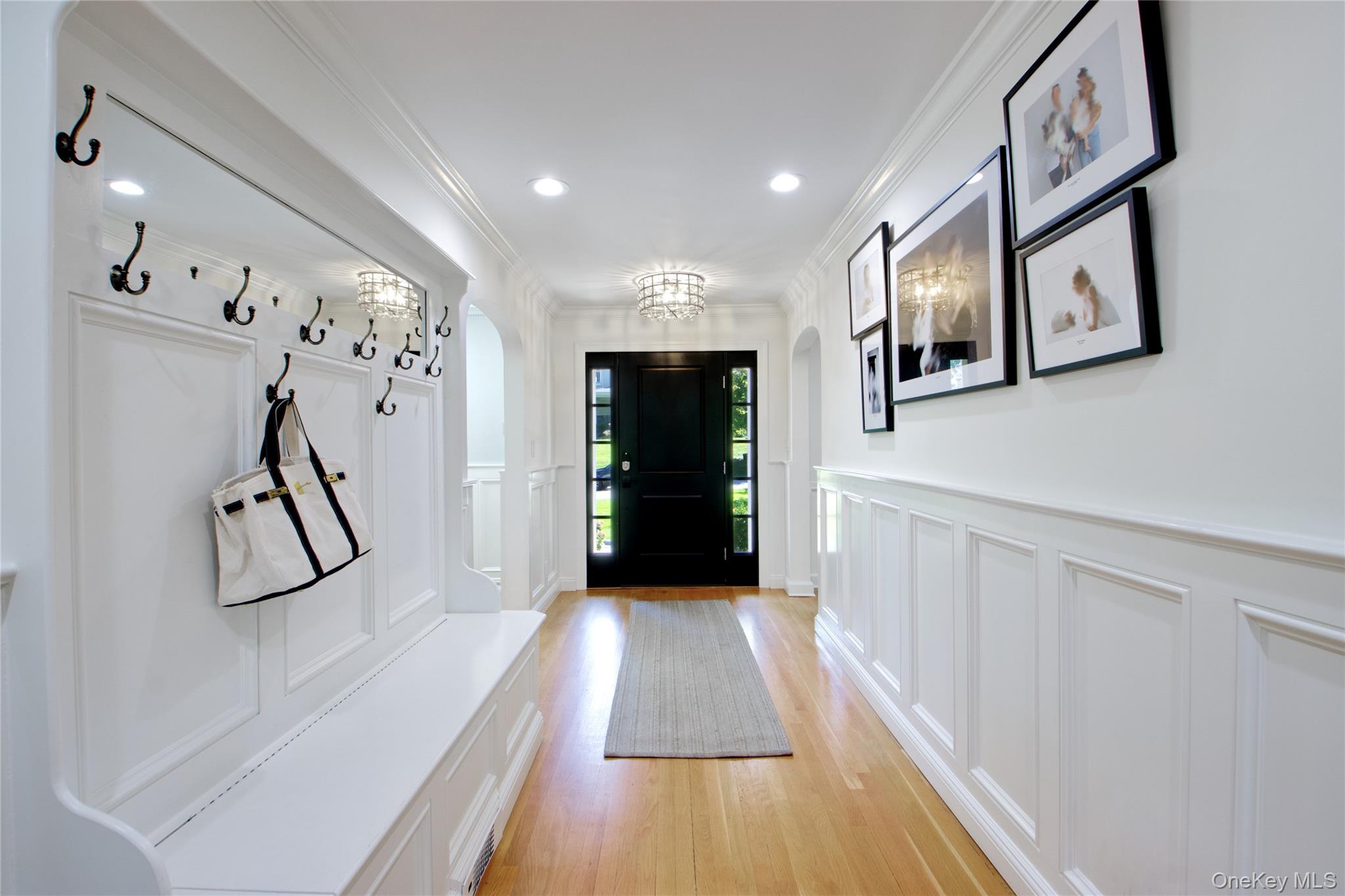 39 Squirrel Hill Road East Hills, NY 11577 - Photo 5 of 35 a view of a hallway with wooden floor