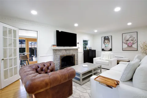 a living room with furniture or outdoor view and a flat screen tv