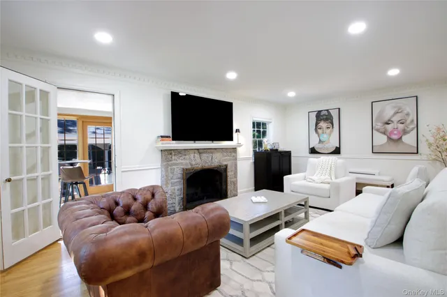 a living room with furniture or outdoor view and a flat screen tv