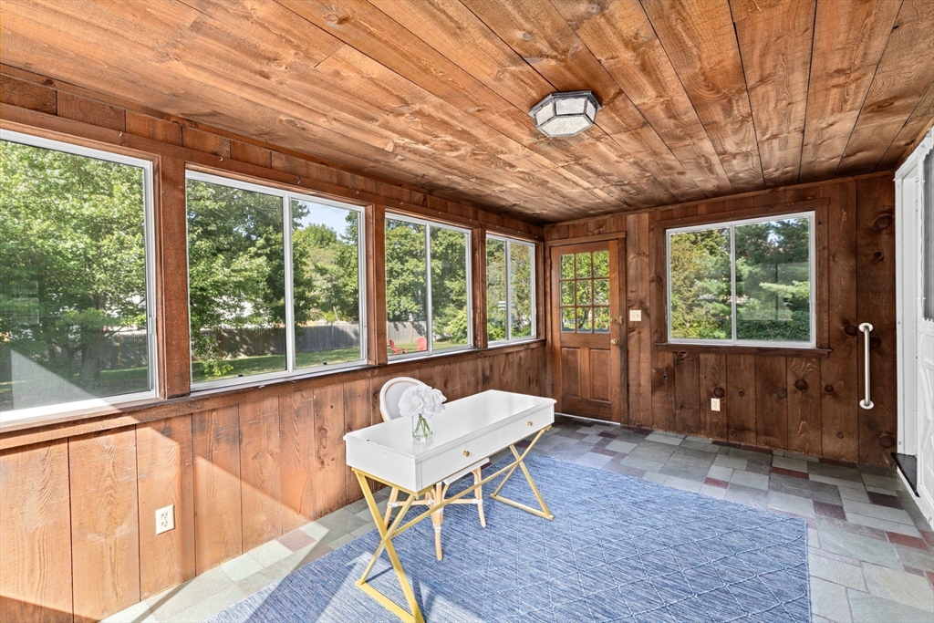 15 Presidents Road Hingham, MA 02043 - Photo 12 of 25 a living room with furniture and a large window