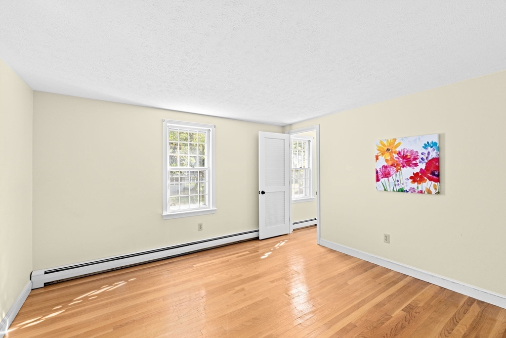 15 Presidents Road Hingham, MA 02043 - Photo 17 of 25 a view of an empty room with a window