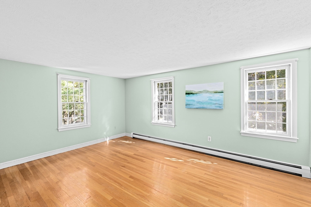 15 Presidents Road Hingham, MA 02043 - Photo 19 of 25 a view of an empty room with a window