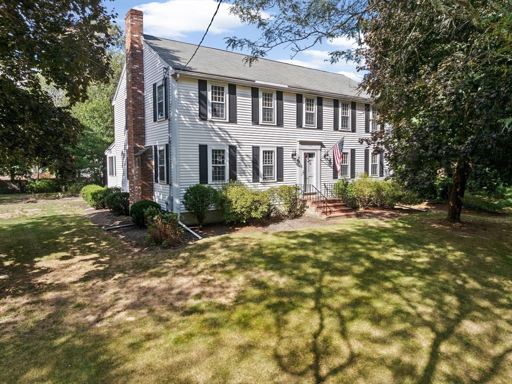 15 Presidents Road Hingham, MA 02043 - Photo 24 of 25 a front view of a house with a yard