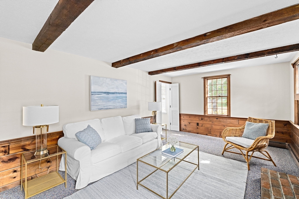 15 Presidents Road Hingham, MA 02043 - Photo 9 of 25 a living room with furniture and a wooden floor