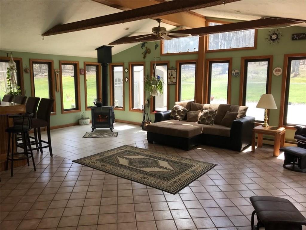 2998 Hadley Road Hadley, PA 16130 - Photo 4 of 25 family room with wood stove