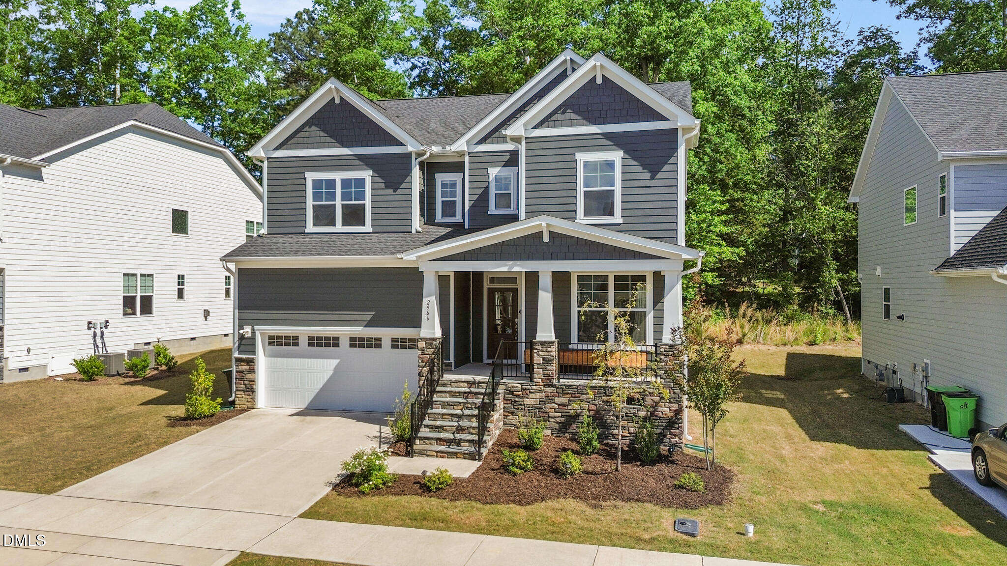 2966 Rise And Shine Road Apex, NC 27502 - Photo 2 of 61 a front view of a house with garden
