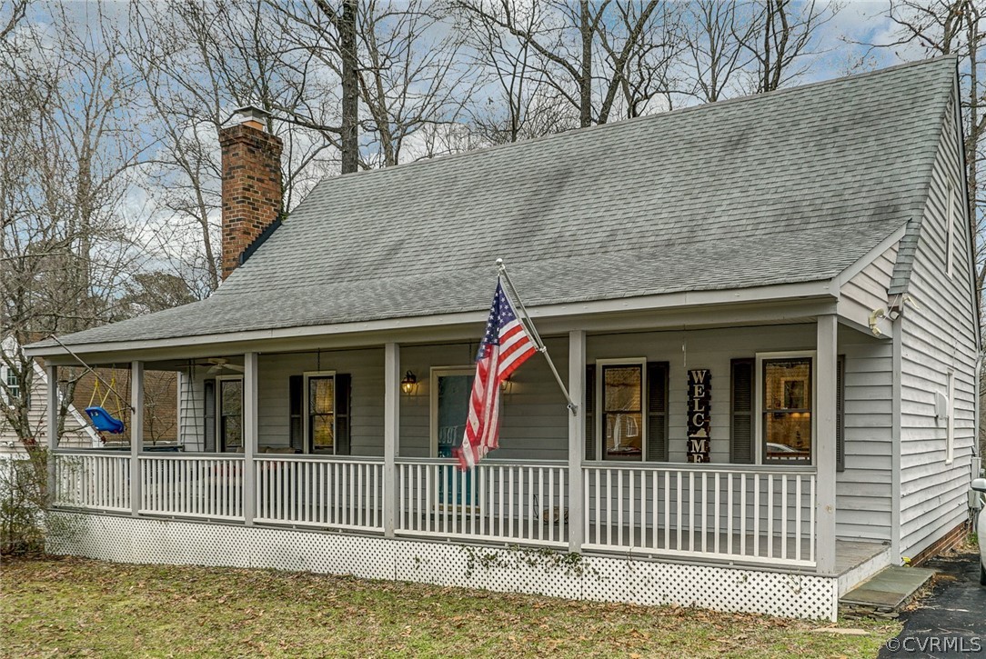 a view of a house with a fence