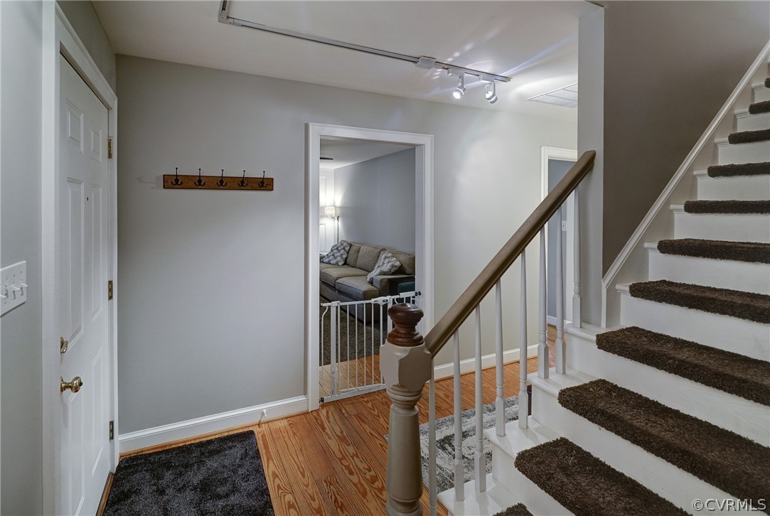 7206 Barkbridge Road Chesterfield, VA 23832 - Photo 11 of 36 a view of entryway and hall with wooden floor