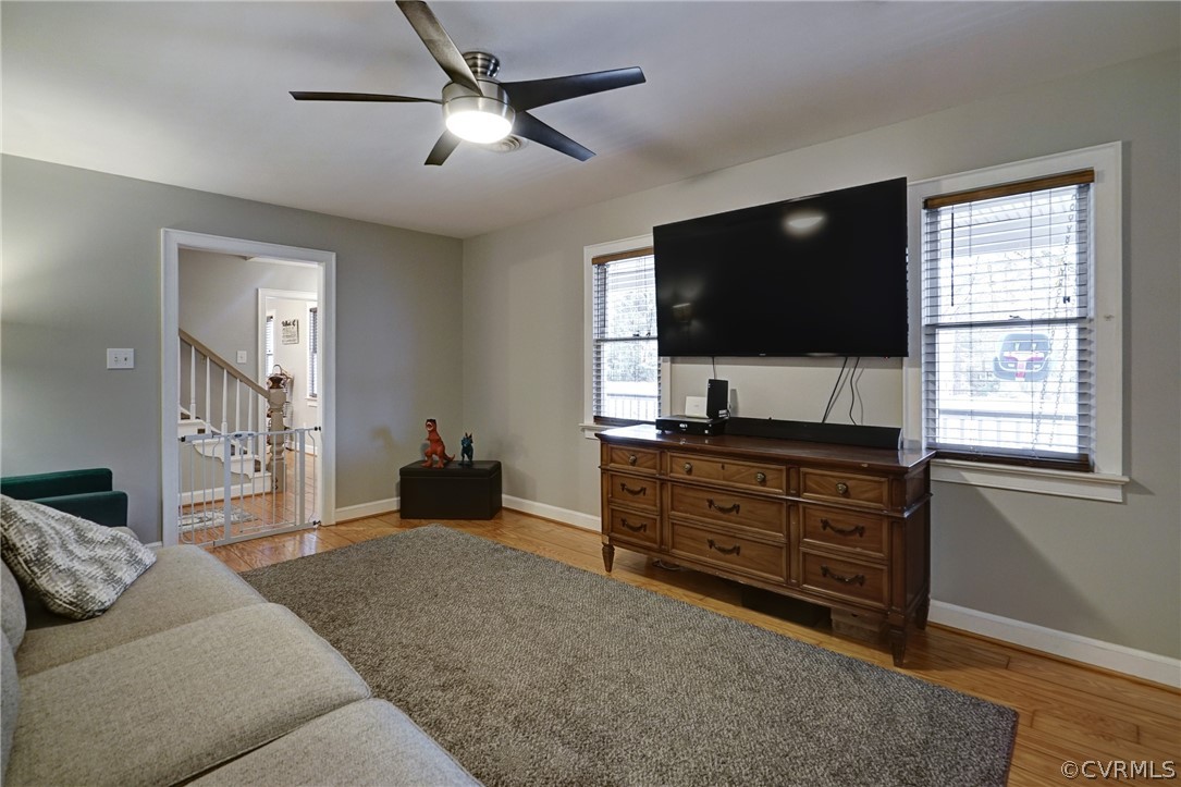 7206 Barkbridge Road Chesterfield, VA 23832 - Photo 14 of 36 a living room with furniture and a flat screen tv
