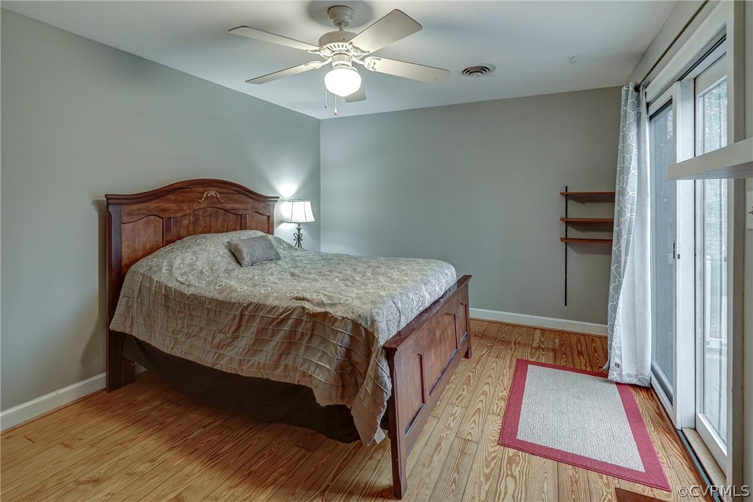 7206 Barkbridge Road Chesterfield, VA 23832 - Photo 19 of 36 a bed sitting in a bedroom next to a window