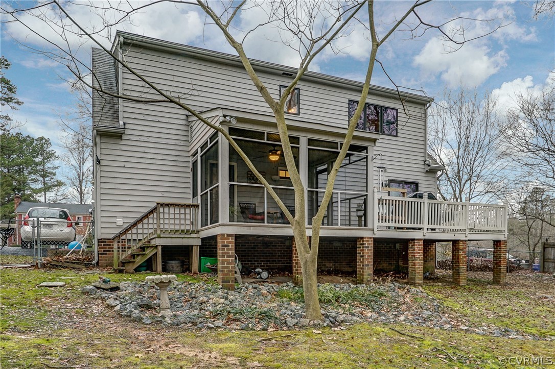 7206 Barkbridge Road Chesterfield, VA 23832 - Photo 29 of 36 a large white building with large windows and a small yard