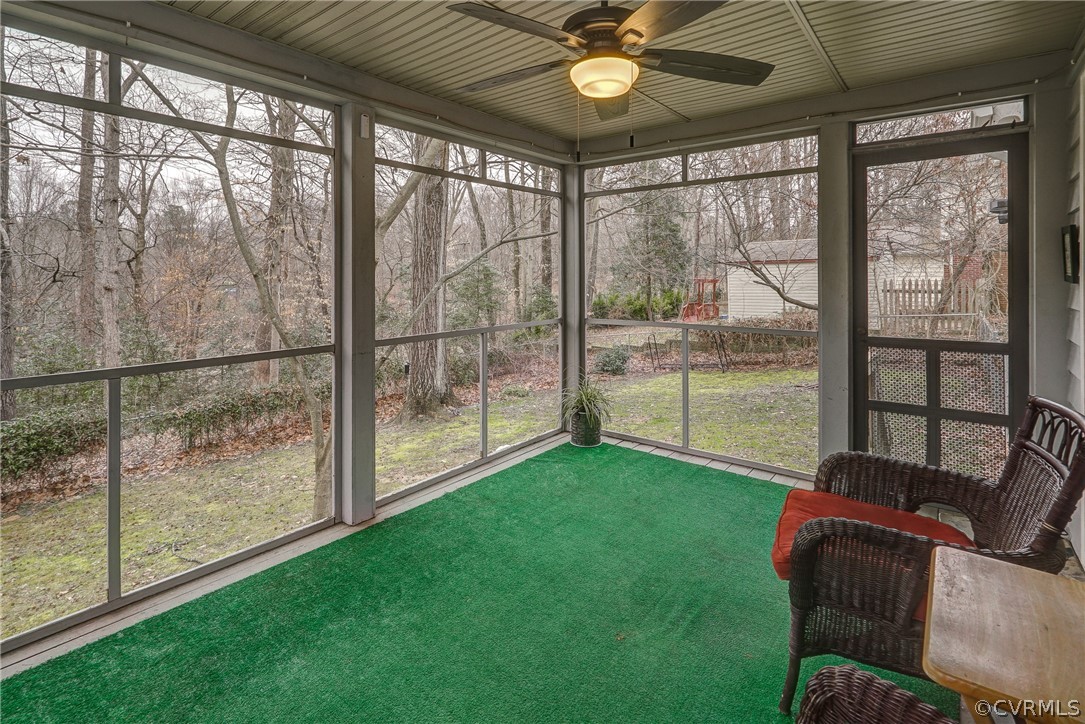 7206 Barkbridge Road Chesterfield, VA 23832 - Photo 34 of 36 a living room with furniture and a floor to ceiling window
