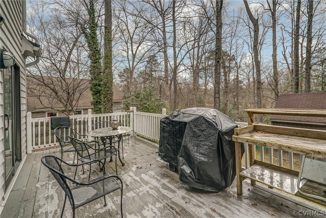 7206 Barkbridge Road Chesterfield, VA 23832 - Photo 35 of 36 a view of a chairs and table on the wooden floor