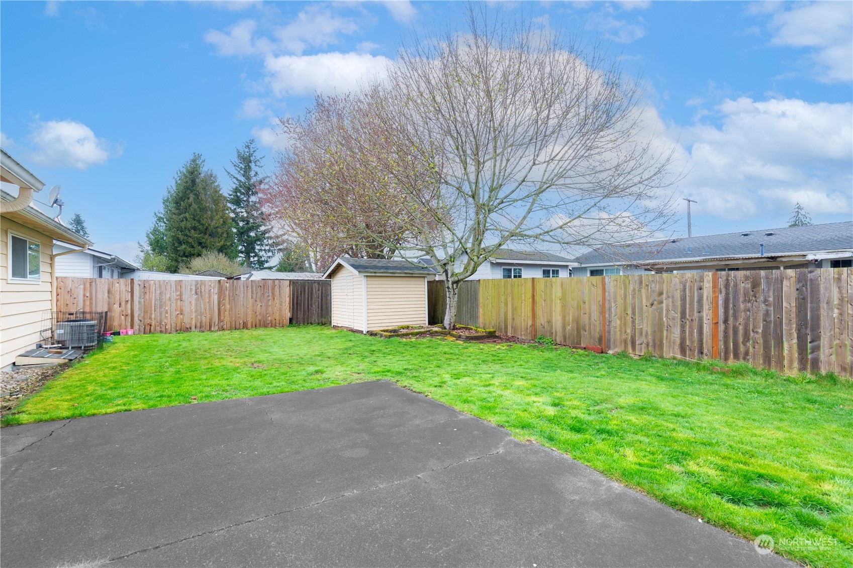 3724 Northeast 9th Street Renton, WA 98056 - Photo 15 of 16 a view of a backyard with wooden fence