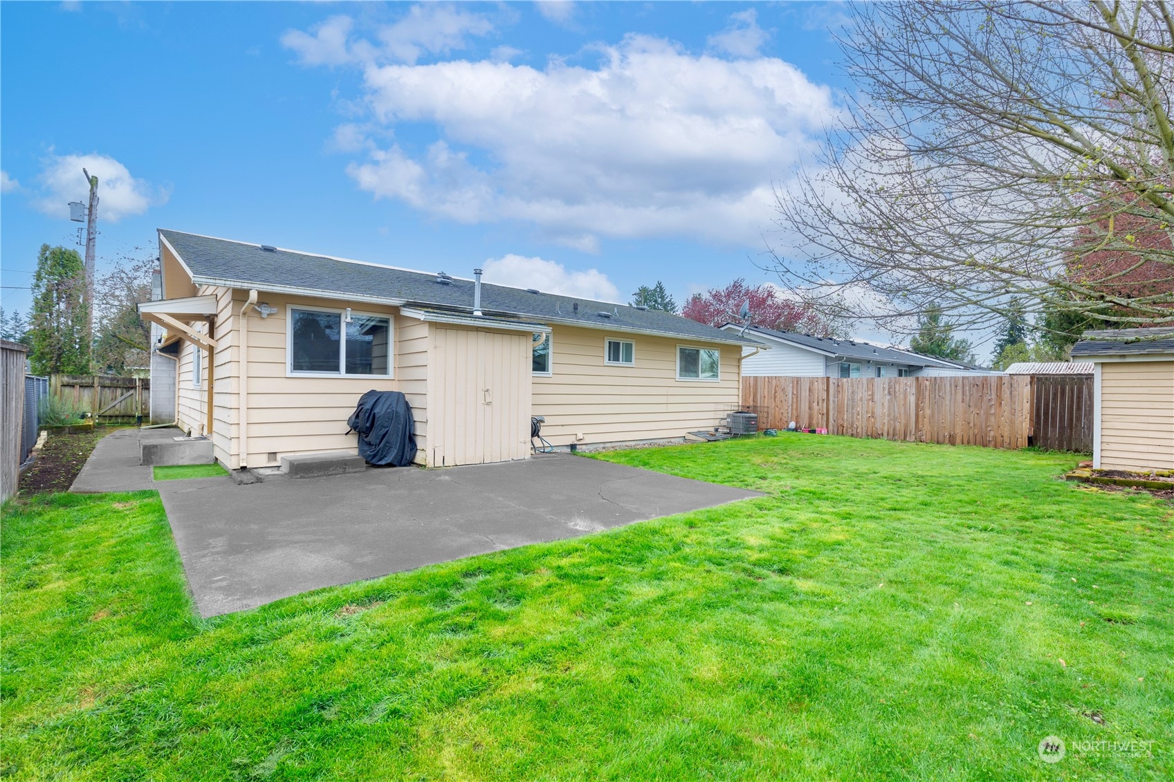 3724 Northeast 9th Street Renton, WA 98056 - Photo 16 of 16 a front view of house with yard and green space