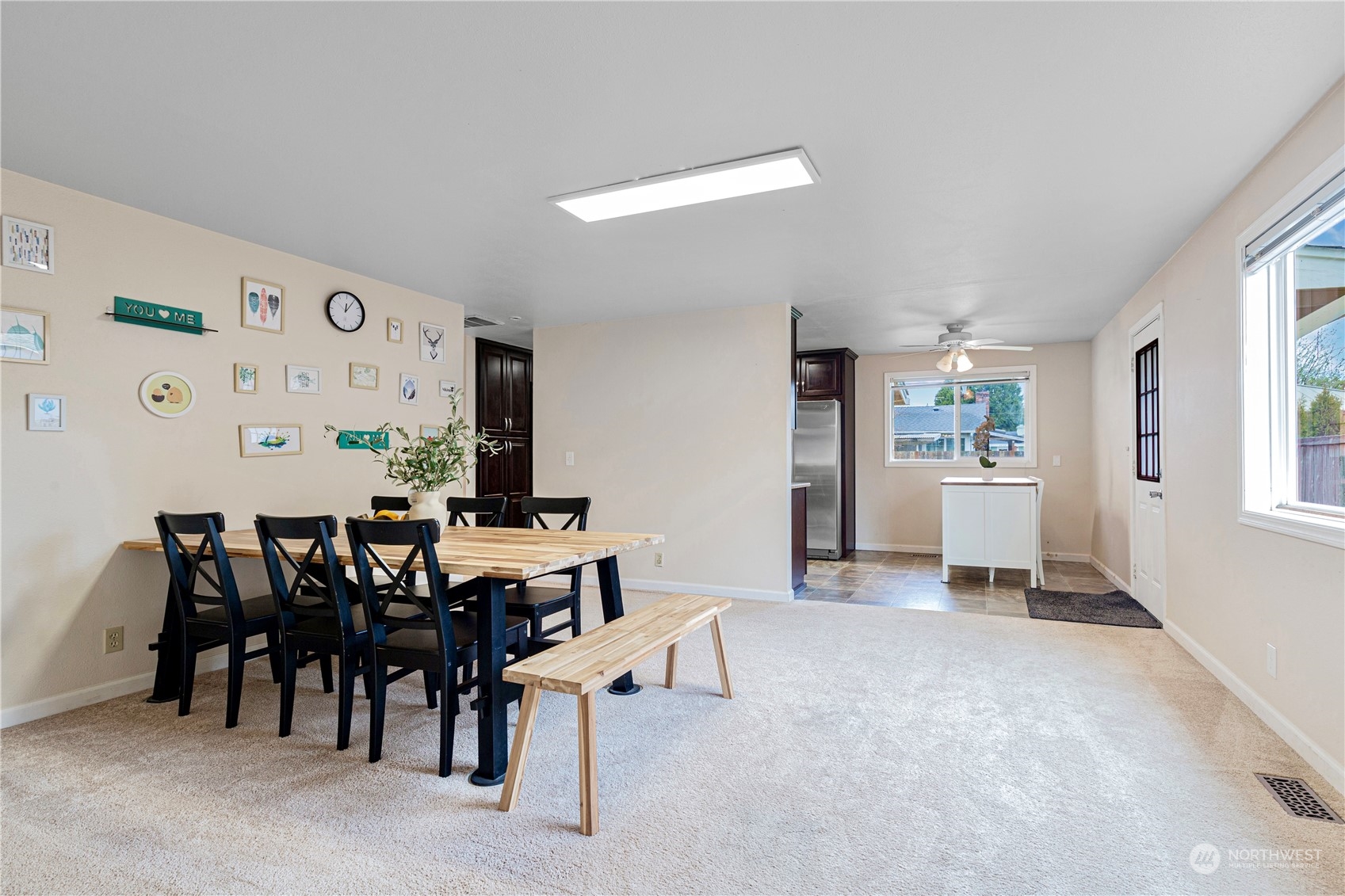 3724 Northeast 9th Street Renton, WA 98056 - Photo 3 of 16 a view of a livingroom with furniture and window