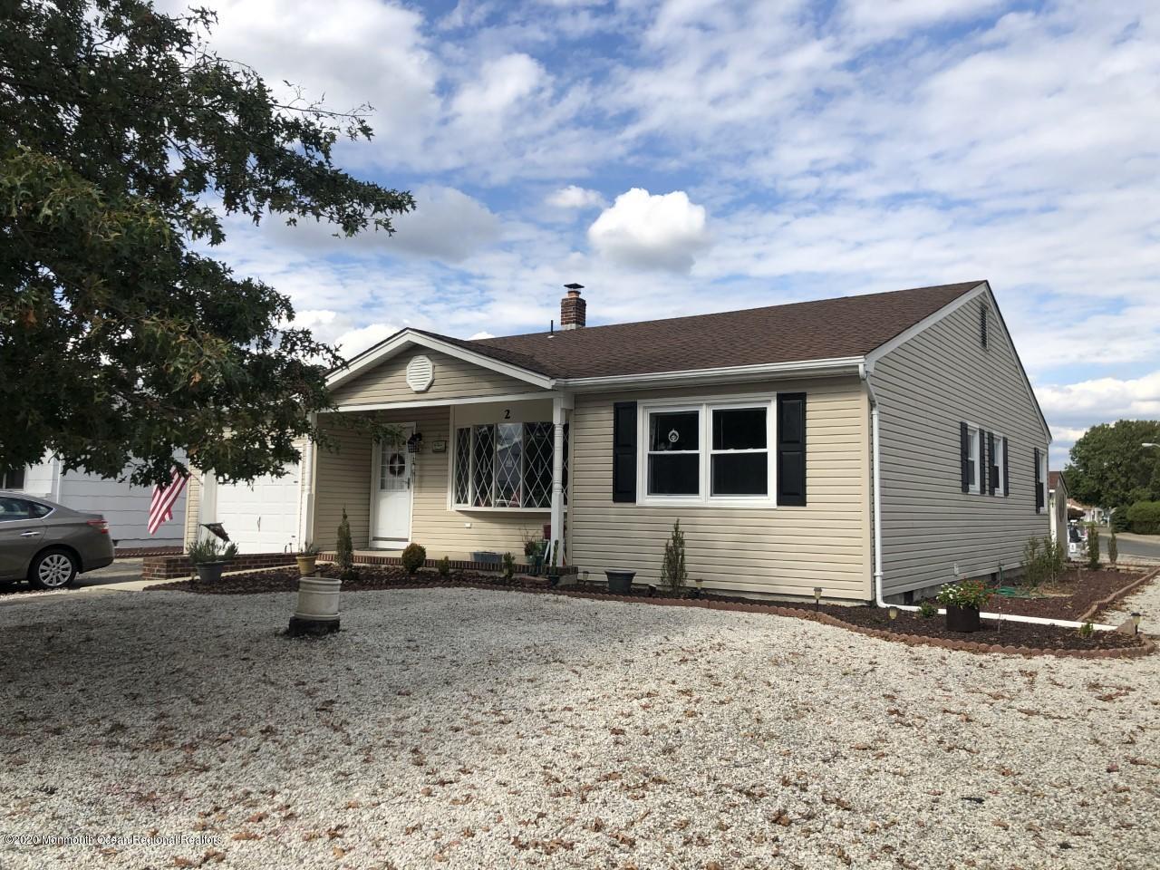 2 Sheridan Road Toms River, NJ 08757 - Photo 2 of 14 a front view of a house with a yard