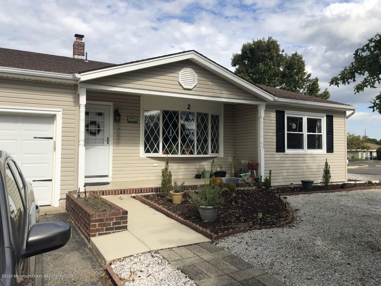 2 Sheridan Road Toms River, NJ 08757 - Photo 3 of 14 a front view of a house with garden