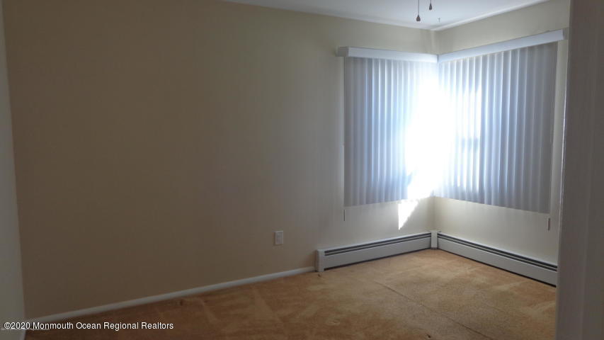 2 Sheridan Road Toms River, NJ 08757 - Photo 8 of 14 an empty room with windows